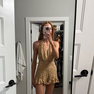 Francesca's Collections Yellow and Black Polka Dot Romper